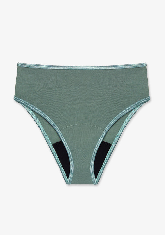 High-waisted women's underwear in a sage green color. The design is simple and modern, with smooth fabric and a comfortable fit. The waistband and leg openings are trimmed with matching sage colored elastic that has a slight sheen, adding a subtle contrast. The interior lining in the crotch area is black, suggesting that this pair may be designed for extra absorbency, possibly as a period panty or leakproof underwear. The overall look is functional yet stylish, offering full coverage with a flattering cut.