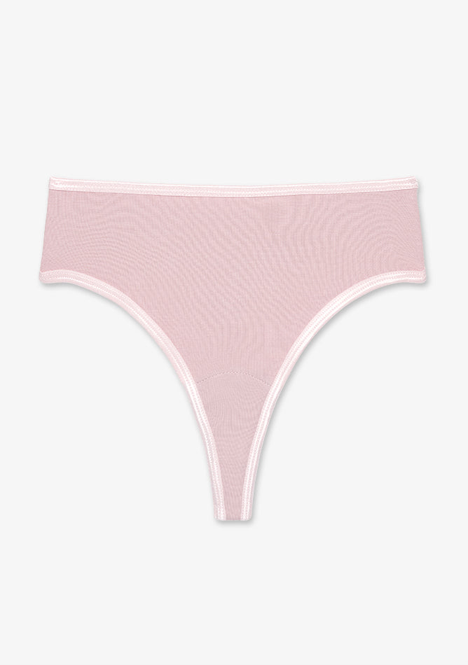 Image shows a  light pink women's thong underwear laid flat against a plain white background. The thong is made of a sheer, mesh-like fabric with a soft, stretchy texture. It features a minimalist design with narrow white trim along the waistband and leg openings, giving it a clean and delicate appearance. The cut is typical of thong-style underwear, offering minimal back coverage.