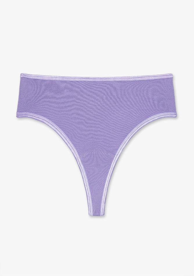 Image shows a woman's thong underwear in a light purple or lavender color, displayed flat against a plain white background. The thong is made from a sheer, mesh-like fabric that appears lightweight and breathable. It features matching purple stitching and trim around the waistband and leg openings, giving it a sleek and minimal design. The cut offers minimal back coverage, typical of thong-style underwear, and is likely intended for comfort and to remain invisible under clothing.
